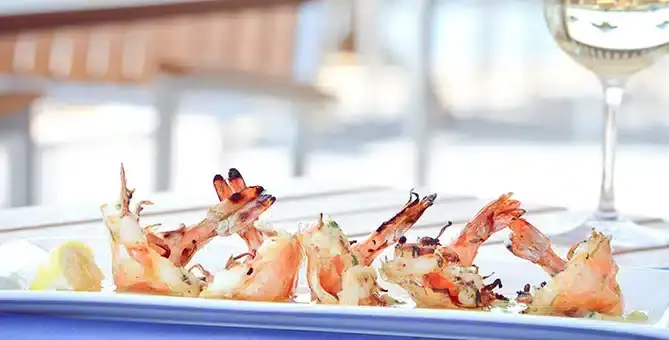 Savor the Coast: Outdoor Dining, Lobster, and Raw Bar Bliss Near Mystic CT