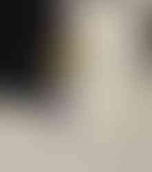 Side profile of Mrs. VP showing the perfect blend of '90s style - yellow fish print shirt layered under a cropped blue jean jacket with grey trousers