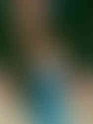 Vintage style portrait of Mrs. VP in ocean-inspired blue dress and white corset top, capturing the outfit's dual styling options