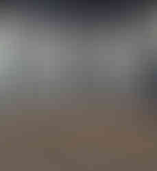 Detail shot of Mrs. VP's classic New Balance 1906R sneakers, essential to her '90s streetwear look