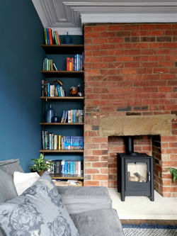 Exposed brick chimney breast