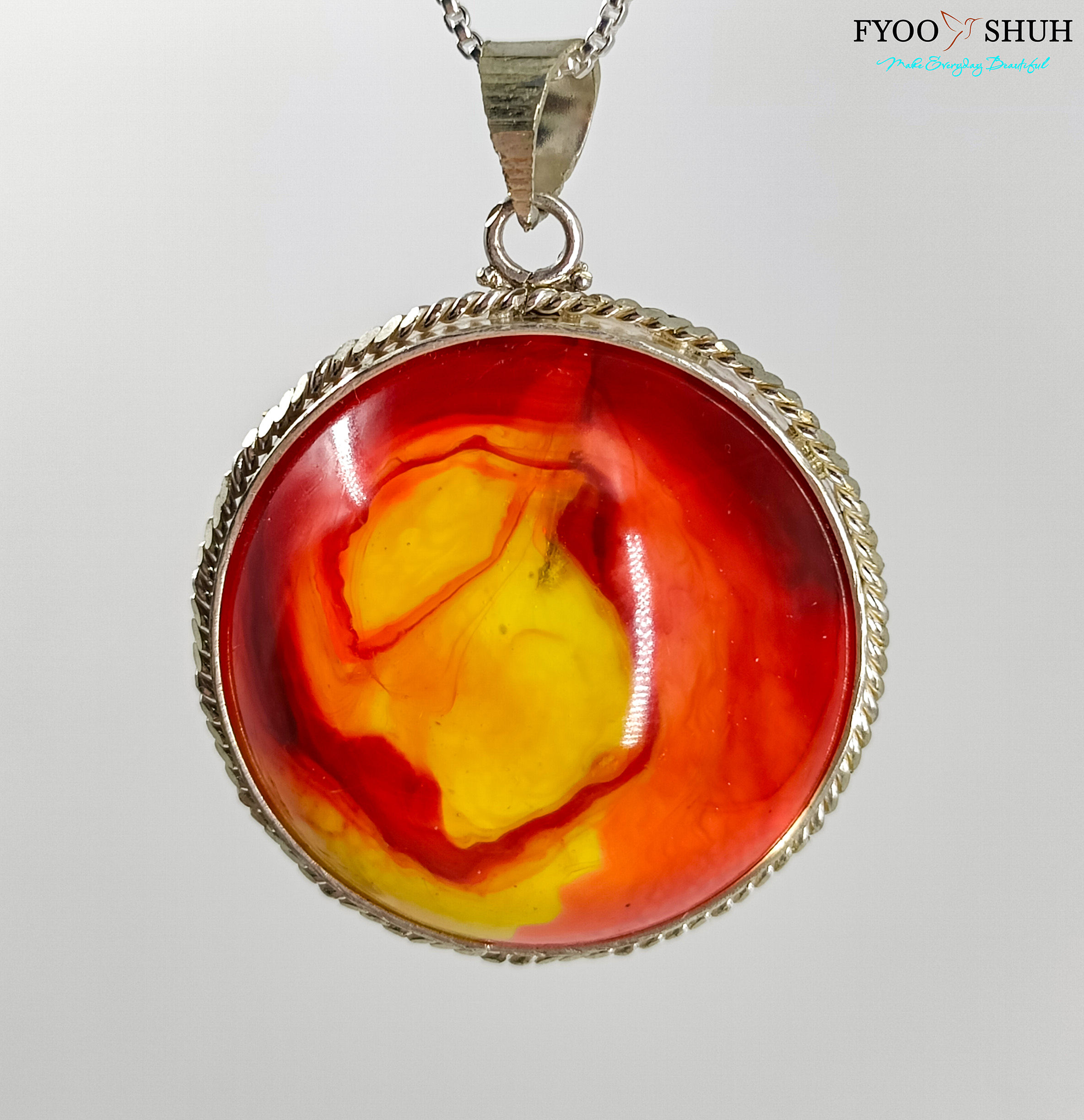 Fire's glow pendant in dotted frame