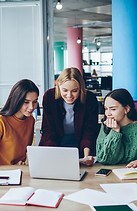 Positive female students watching traini