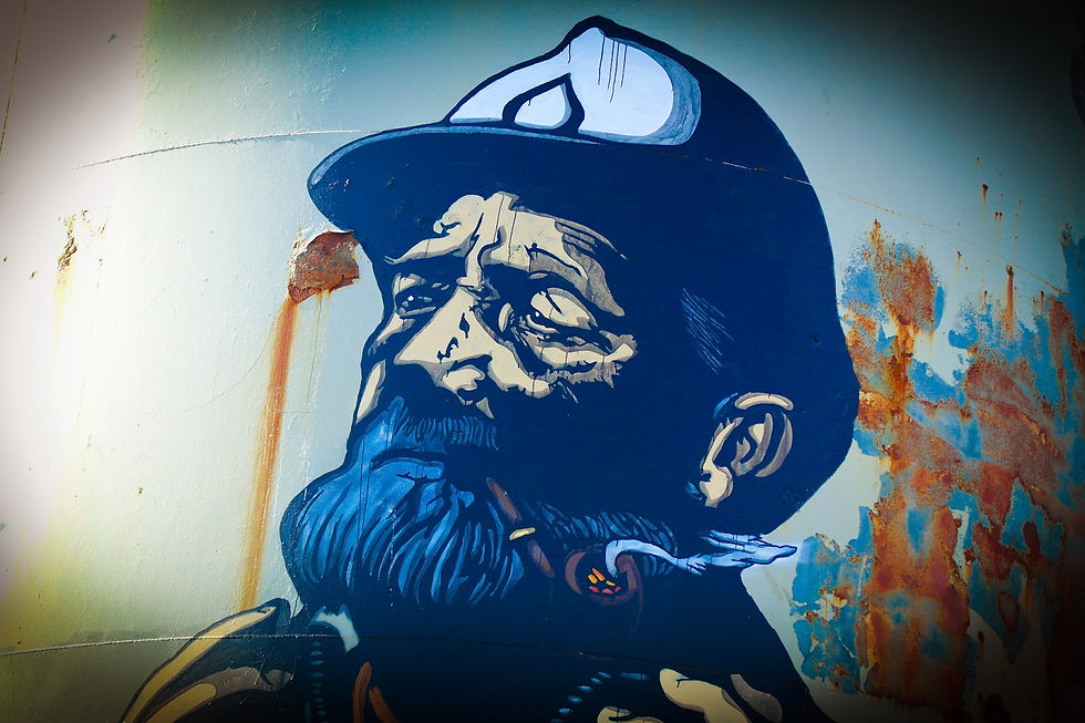 Close up picture of "The Fisherman 2014" is transformed into an oil worker.