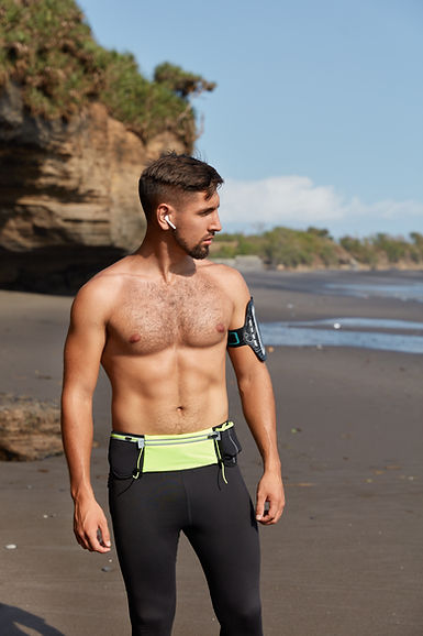vertical-shot-half-naked-healthy-male-athlete-takes-break-after-workout.jpg