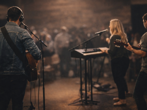Christian musicians leading worship in a church setting