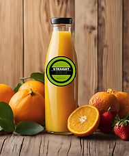 A bottle of Straight Juice orange juice on a rustic wooden table, surrounded by fresh oranges, strawberries, and green leaves