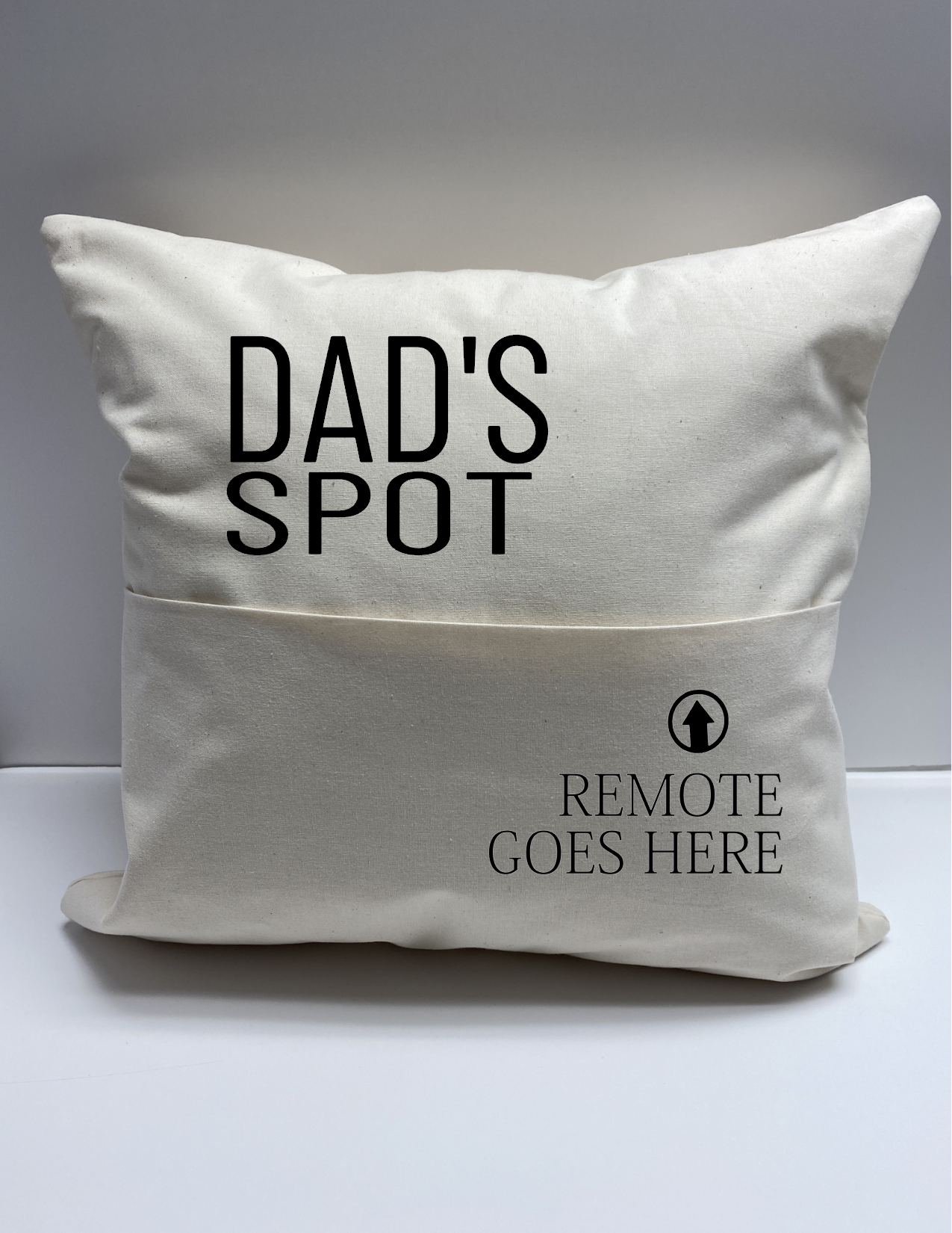 Cushion with pocket for remote