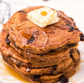 Chocolate chip pancakes with pure local maple syrup and butter.