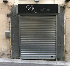 Pose grille/rideaux métalliques pour les commerçants