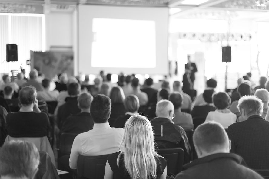 Faded background of people at a training seminar