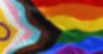 A progress pride flag blowing in the wind