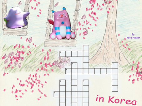 Two colorful cartoon creatures on swings under a cherry blossom tree with blooming pink flowers. A crossword puzzle titled "Characters in Korea" below.
