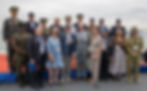 Group of Men and Women some in military dress uniforms at the Incheon 75th Anniversary Commemoration