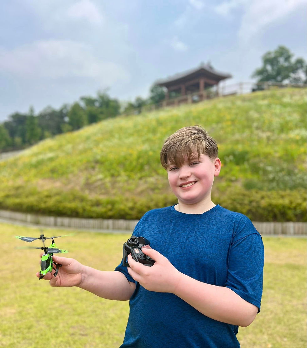 Joshua A. explores a local park with a local community group