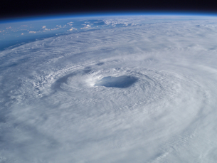 Hurricane formation near Puerto Rico representing fire, hurricane and earthquake property insurance protection.