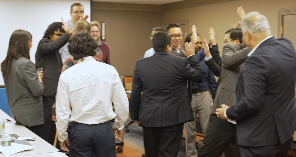Leadership workshop participants enjoying an interactive team exercise during a session in Bridgewater, New Jersey.