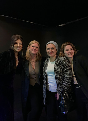 Pia posing at a recording studio with three XR professionals