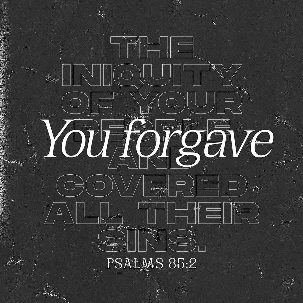 Black textured poster with layered text: You forgave and covered all their sins. Psalm 85:2.
