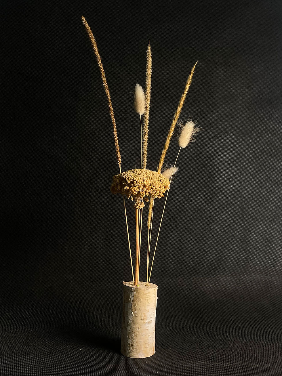 Sandrine Flor'art - Composition florale épurée, mettant en valeur des lignes naturelles