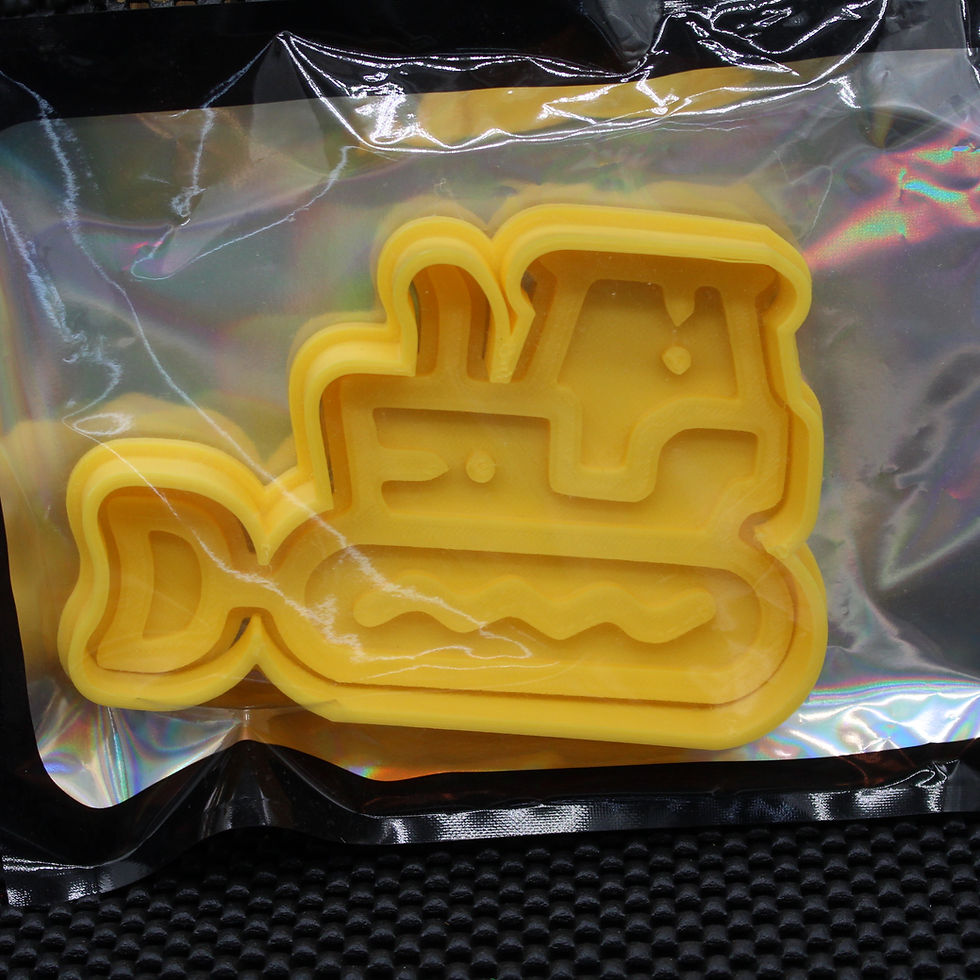 Yellow bulldozer cookie cutter. Fun, creative baking tool. Perfect for themed events!