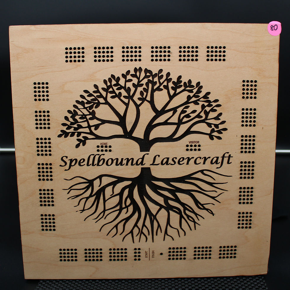 Wooden tree design with Spellbound Lasercraft LLC laser engraving art.