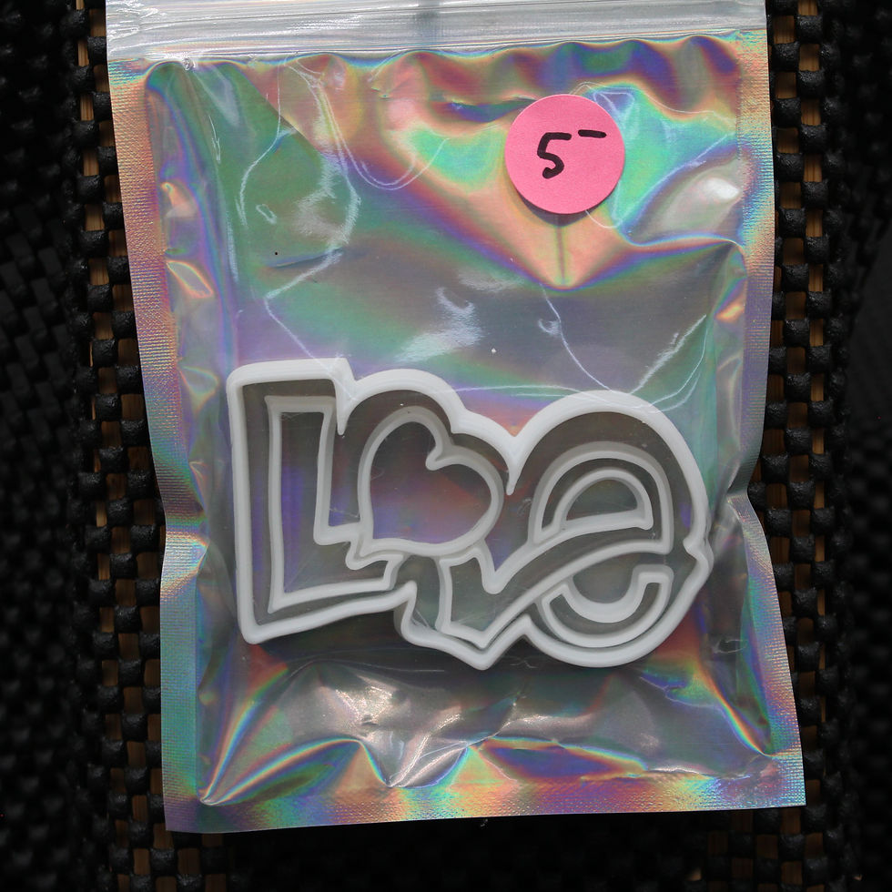 Thumbnail: Love cookie cutter design inside bag with pink $5 tag, ready for sale.