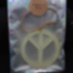Cranberry Bliss peace sign car freshie, $5.00 price tag visible. SpellBound LaserCraft LLC