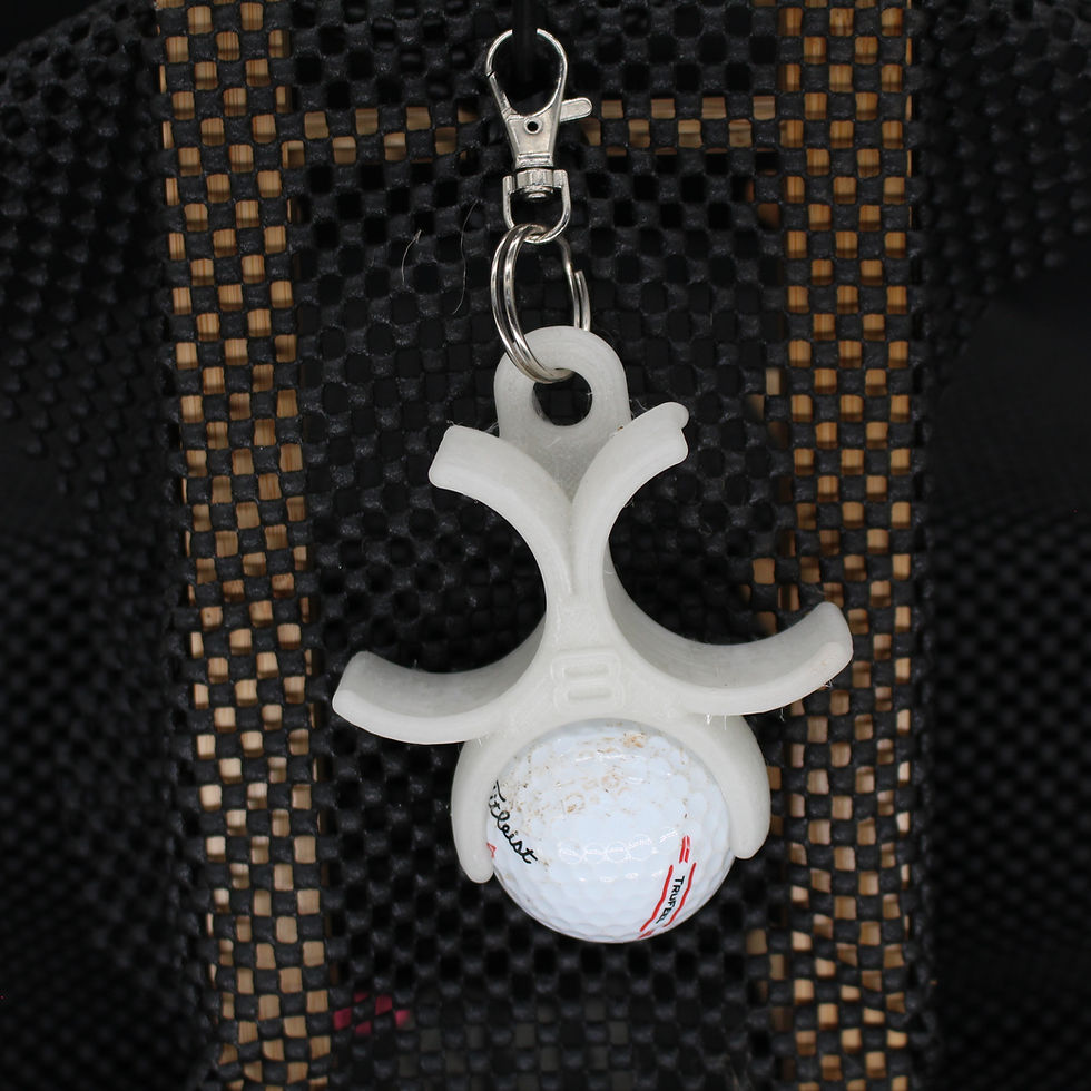 Golf ball in white 3D printed keychain with clasp and intricate design