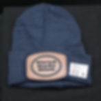 Thumbnail: Blue beanie with Tired Dads Club patch, price tag, black background.