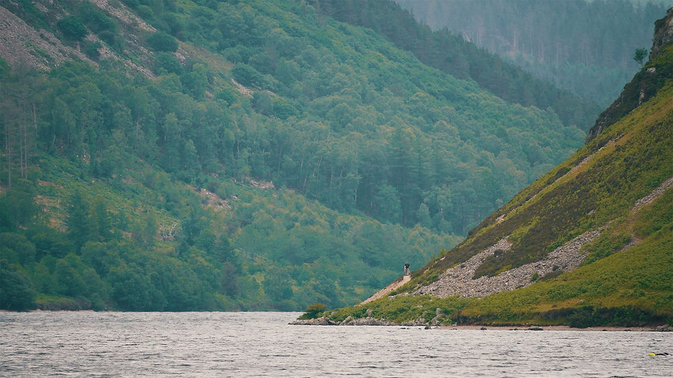Eye-level view of a winding mountain path symbolising a journey through challenges
