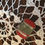 Thumbnail: Small doll purse of velvet covered metal