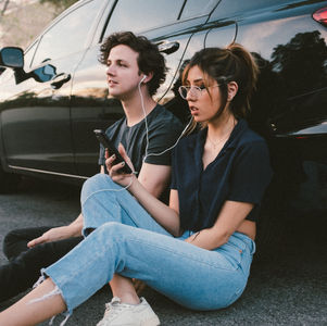 image of people listening to music 