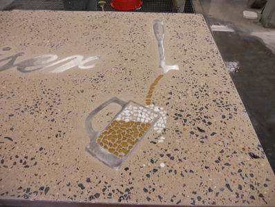 concrete with beer mug inlay