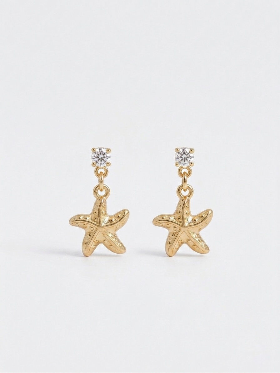 Thumbnail: Gold starfish drop earrings with zirconia studs