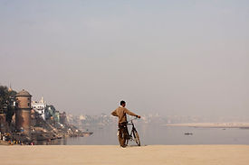 Man Holding Bicycle