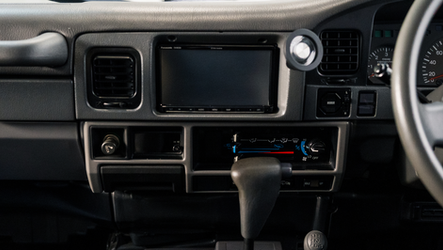 web-16x9_listing-images_KZJ78-Land-Cruiser-H_T_Black_0032-interior-detail-head-unit.png