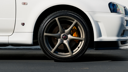 web-16x9_listing-images_Nissan-BNR34-VSpecII-White0012-exterior-front-wheel-driver.png
