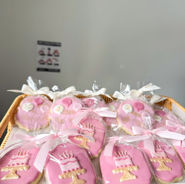 decorated sugar cookies with packaging and bow