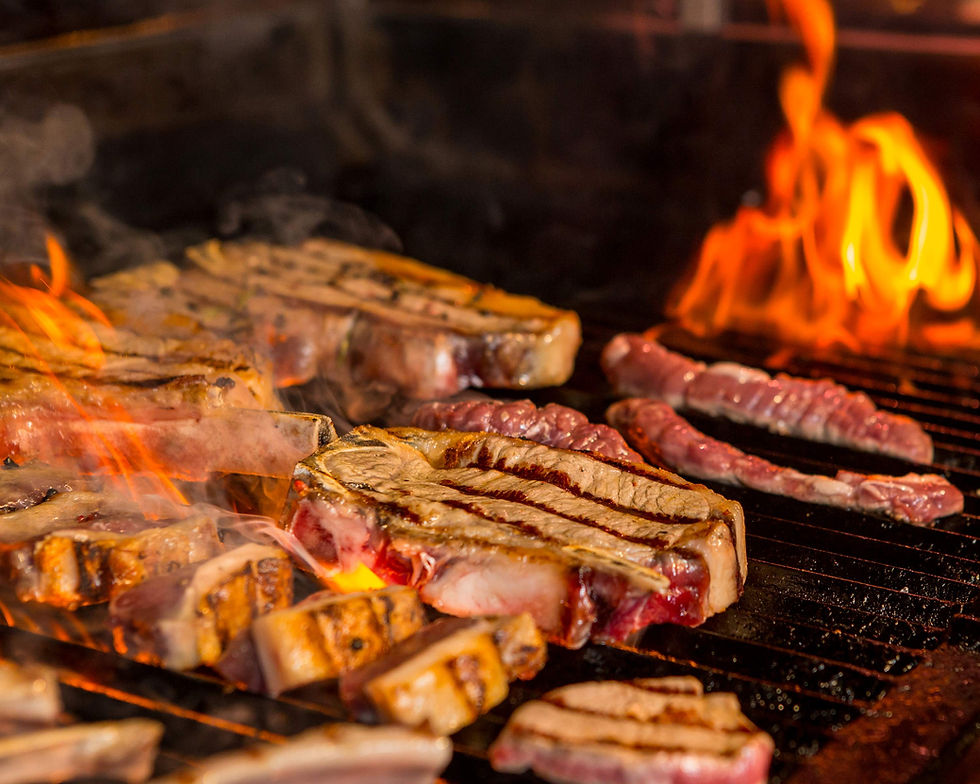 half-grilled-half-ready-raw-steaks-grill.jpg