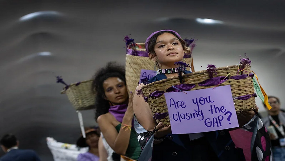 Feminist activists protesting for gender justice at the COP30 climate conference in Brazil Source: Italian Climate Network (https://www.italiaclima.org/en/cop30-gender-action-plan-the-text-is-ready-but-the-agreement-is-not-yet/)