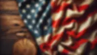 DALL·E 2024-06-22 09.35.17 - An image of the American flag made out of fabric, draped acro