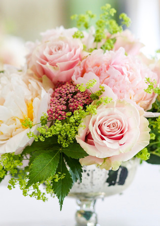 Wedding Flowers at The Dorchester Hotel. Table centrepiece at The Penthouse and Pavilion.