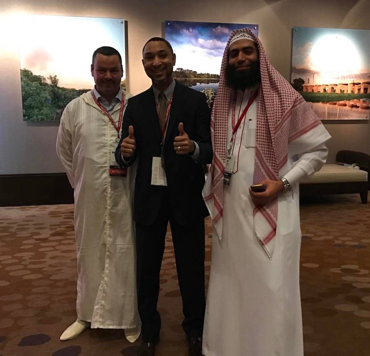Darrance Tezino at a Halliburton international conference, alongside international attendees