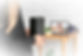 Woman holding mortuary urn and frame with picture of dog on table near white brick wall, c