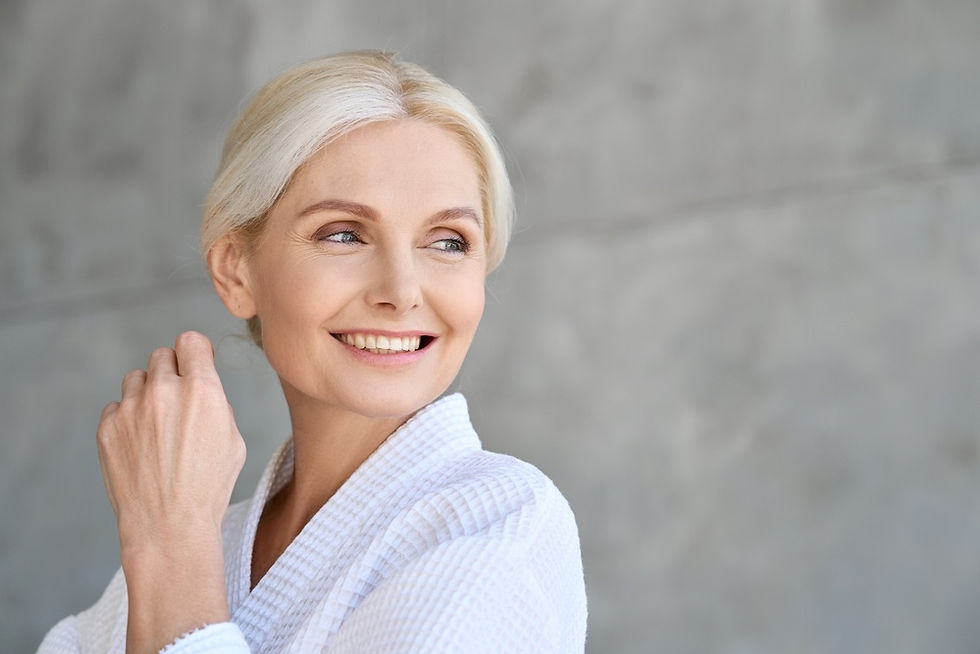 Blonde female smiling after getting hormone replacement therapy in Fountain Valley ca