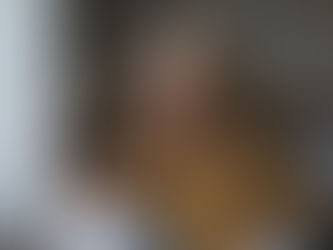 Senior Woman with happy contented look on her face walking on the beach