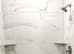 Custom ceratmic tile walk-in shower in a Bathroom remodel by Emerald Builders in Hammonton, NJ.