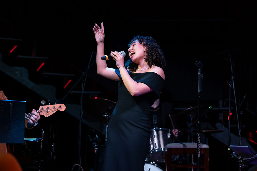 Emily Grace Lucas singing.