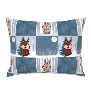 Small pillow with a winter reindeer design with mixed tiles. Tiles include soft blues of trees and accents with one having a white moon and stars. Another tile has a pink cute reindeer that has stitching patterns on the outline. She has a green scarf around her neck and white birch trees in the background. Another tile has a brown reindeer with stitching patterns and a red scarf. Reindeer has two antlers, right antler is smaller than the other. Background is a blue plaid Christmas tree.